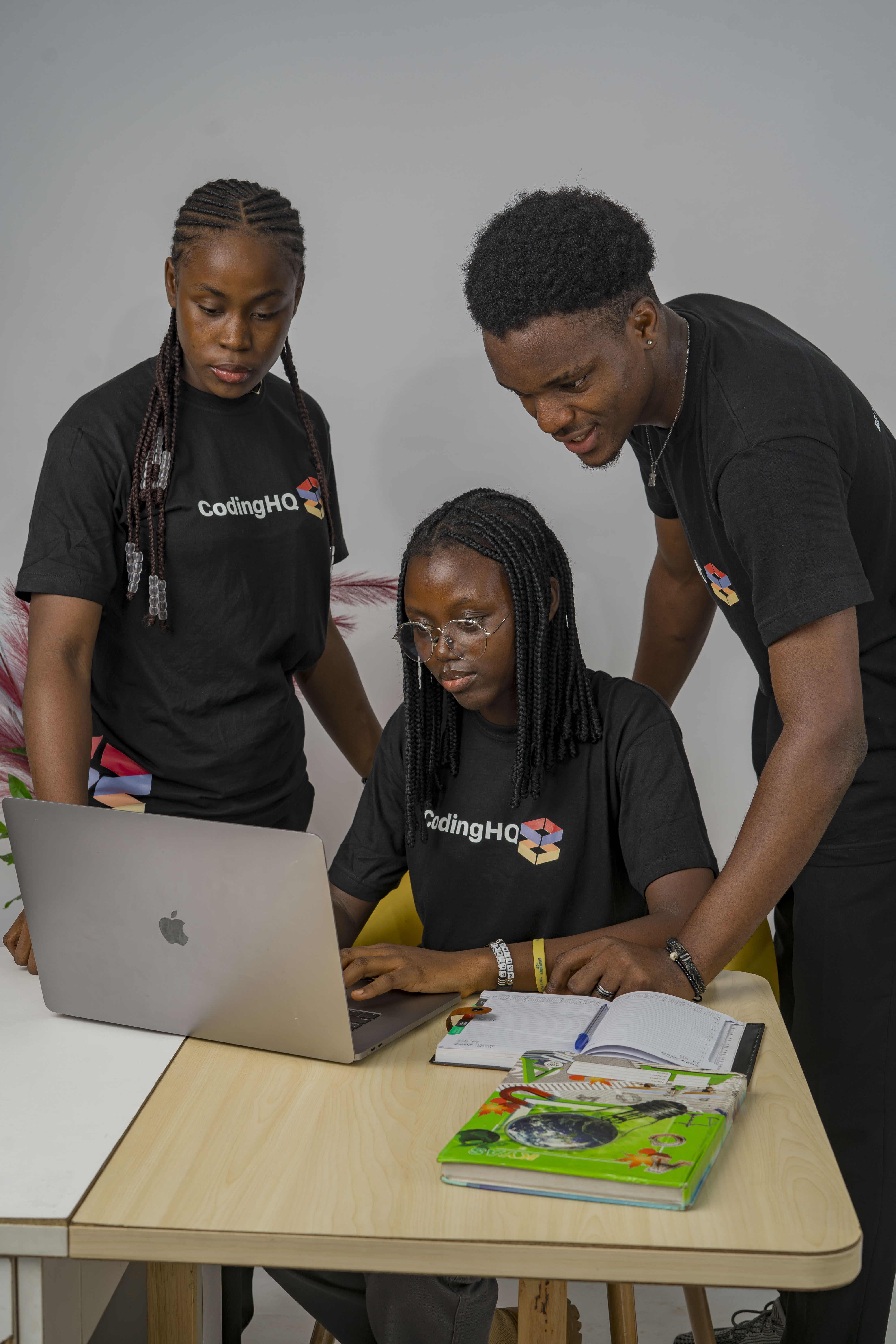 Young Cameroonian developers collaborating at a CodingHQ workshop in Douala